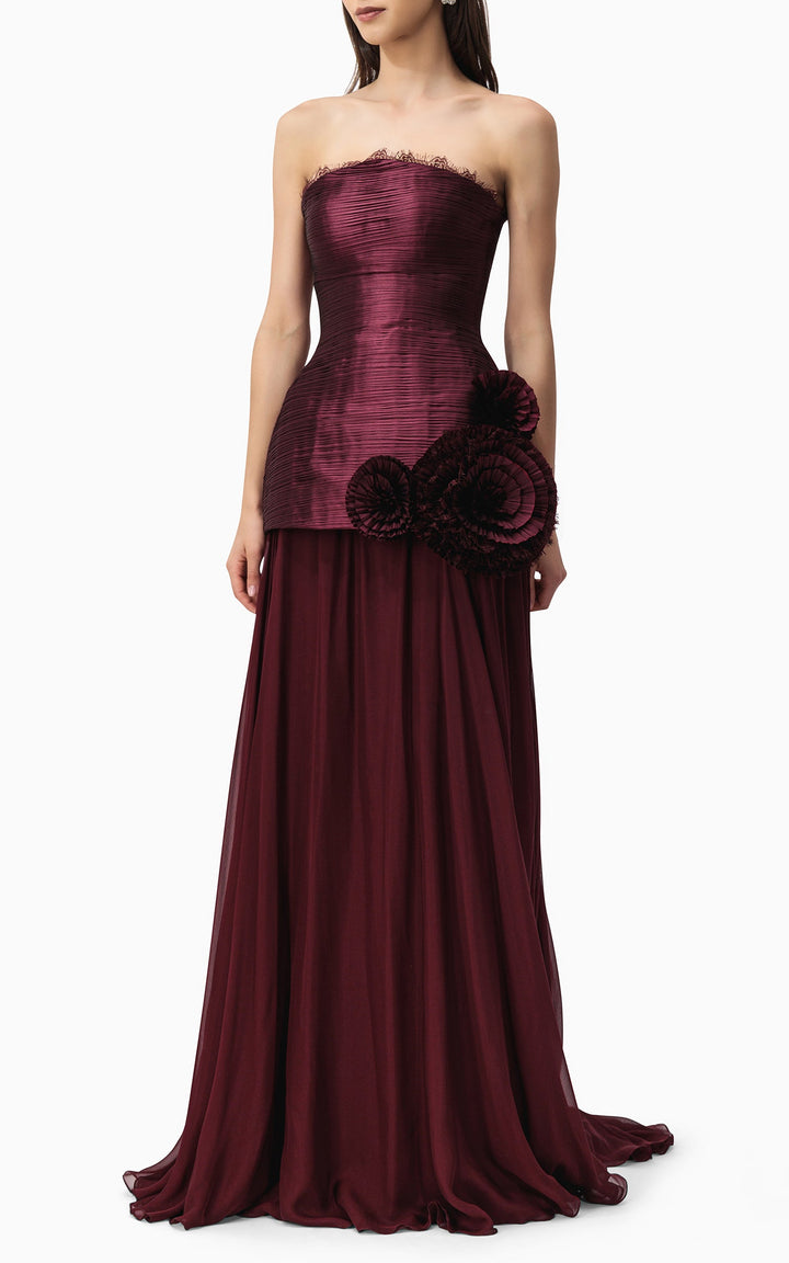 strapless pleated gown with floral side appliqué – BORDEAUX BLOOM