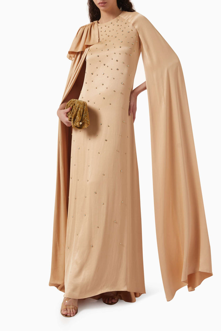 embellished cape-sleeve gown with draped shoulder – AURELIA