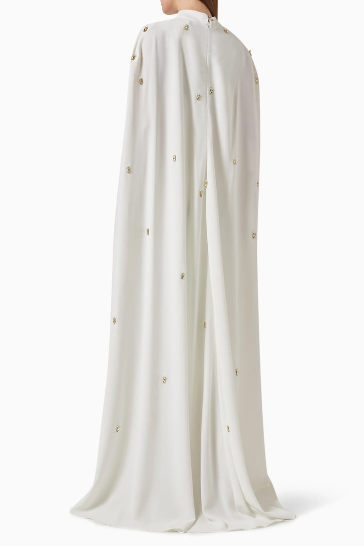embellished cape gown with crystal accents – THRIIYE
