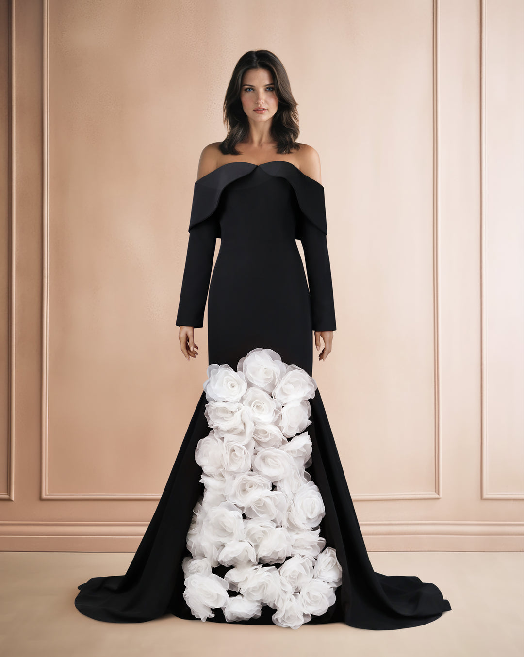 Strapless black dress with 3D flowers and a train