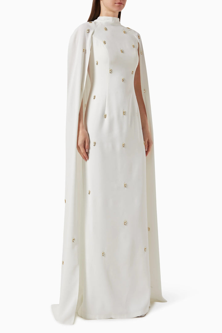 embellished cape gown with crystal accents – THRIIYE