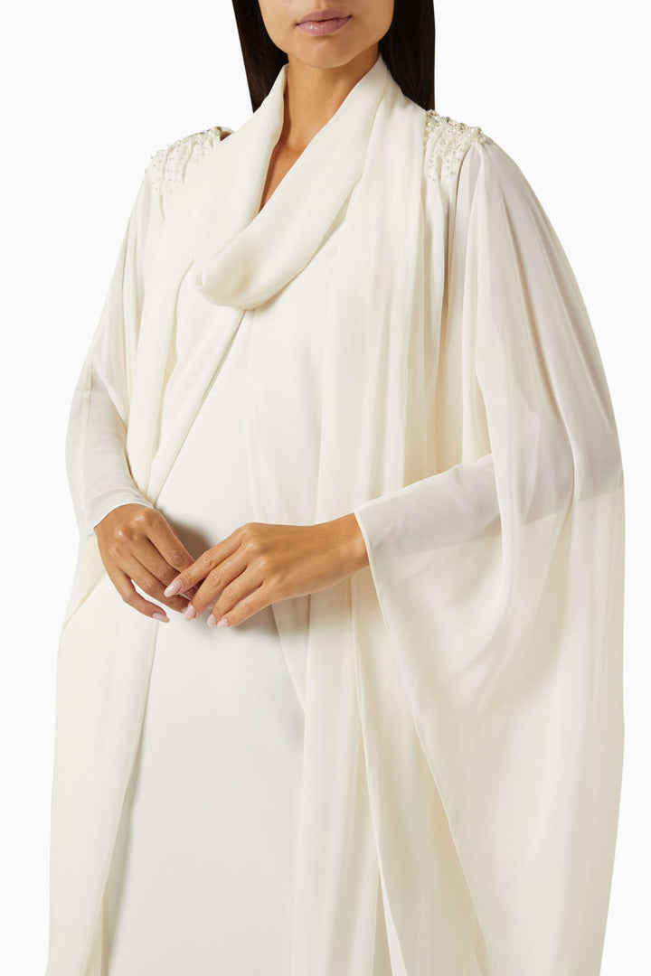 Draped cape gown with embellished shoulders – IVORYE