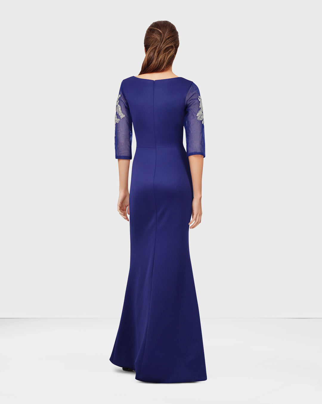 Sequined floor-length blue dress with see-through sleeves