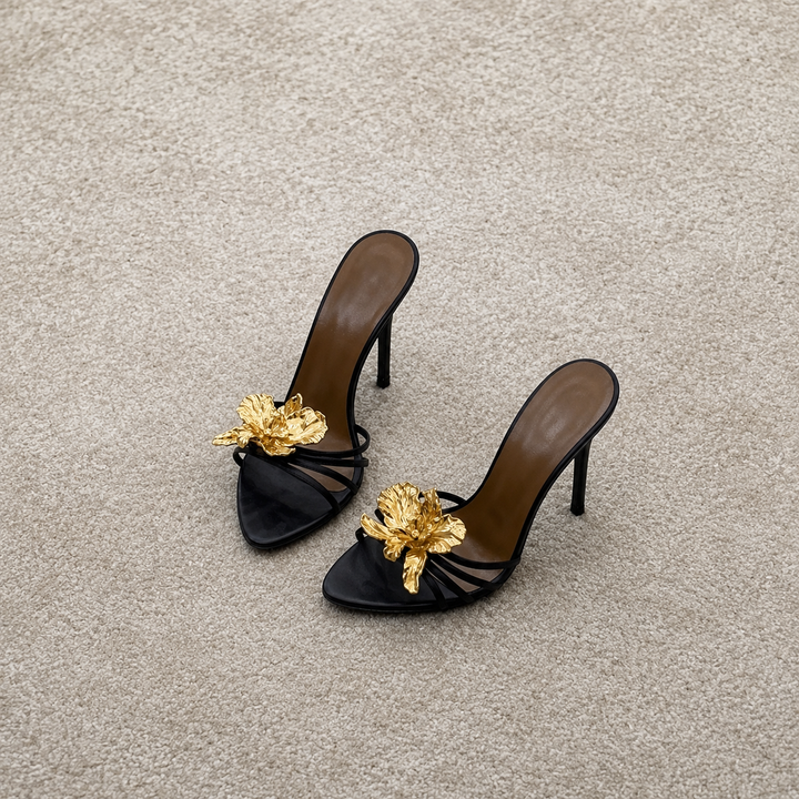 black stiletto mules with gold sculpted flower – CALISTA