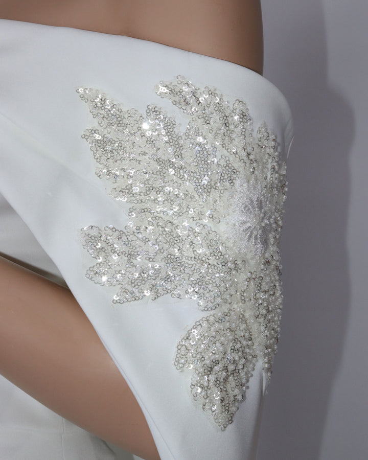 Strapless Sequined dress with a long train