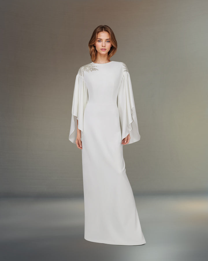 White column dress with ruffled sleeves and sequined shoulders