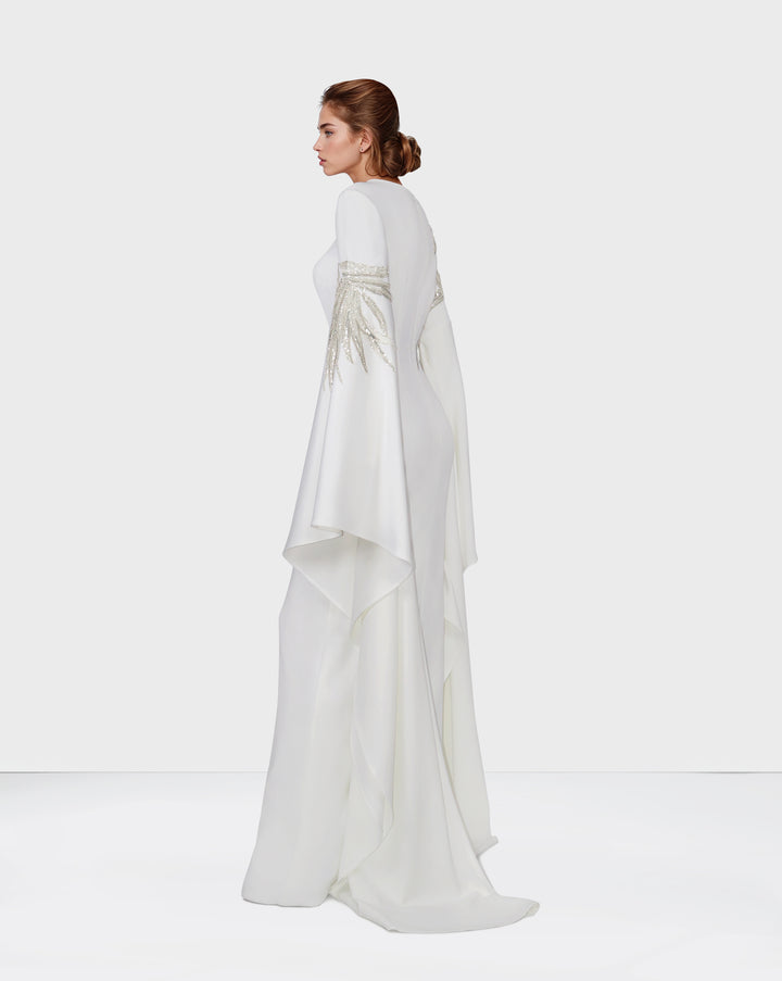 Sequined white dress with floor-length sleeves