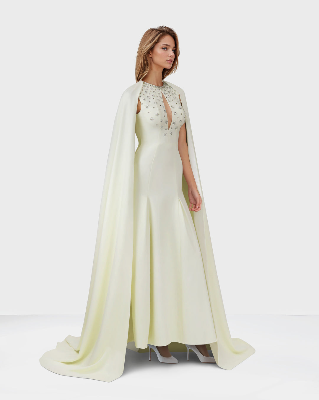 Beaded ivory dress with floor-length cape sleeves