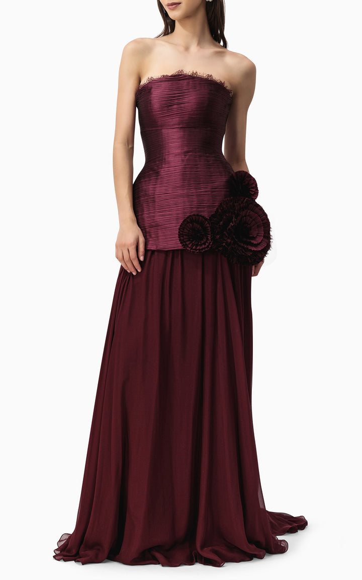 strapless pleated gown with floral side appliqué – BORDEAUX BLOOM
