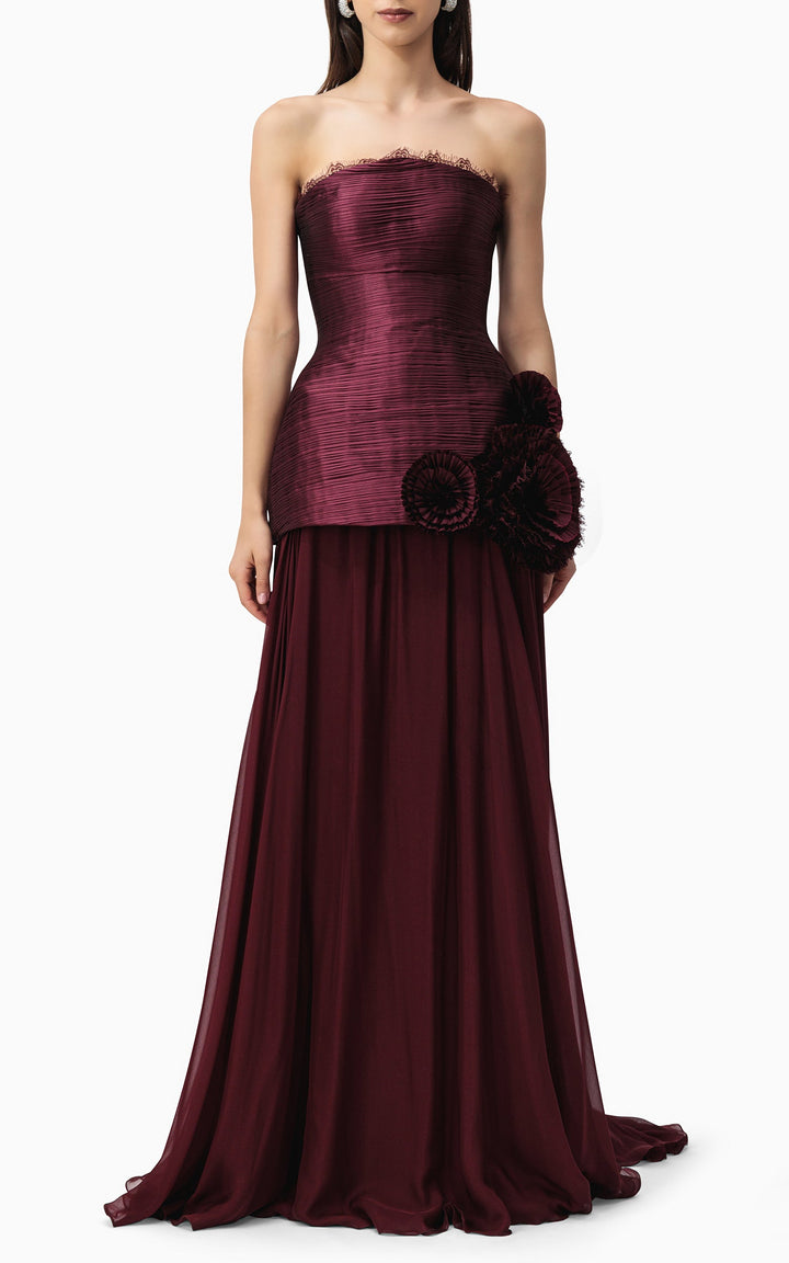 strapless pleated gown with floral side appliqué – BORDEAUX BLOOM