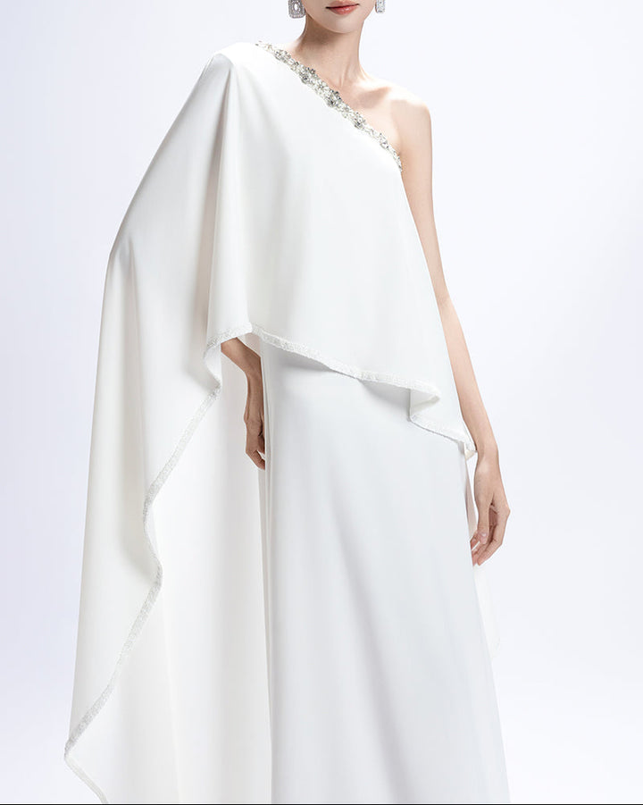 one-shoulder cape gown with jeweled neckline – IVORYE