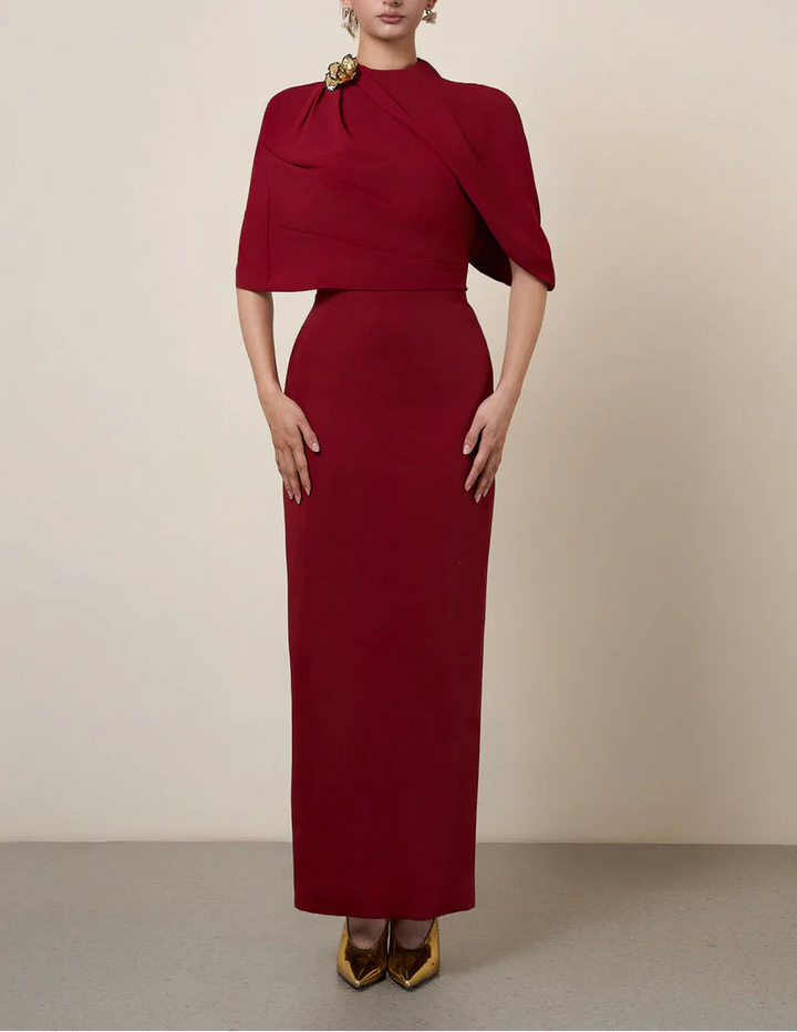 asymmetric cape gown with sculpted shoulder detail – ADRIANA