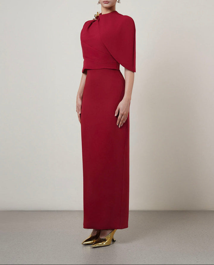 asymmetric cape gown with sculpted shoulder detail – ADRIANA