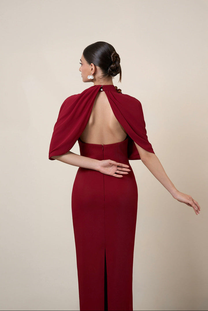 asymmetric cape gown with sculpted shoulder detail – ADRIANA