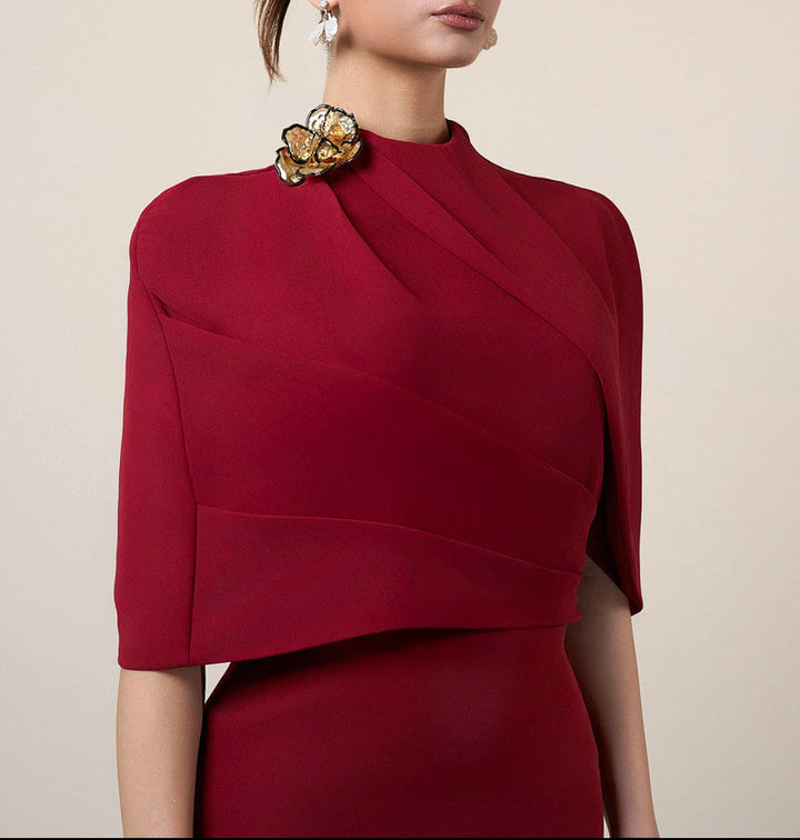 asymmetric cape gown with sculpted shoulder detail – ADRIANA