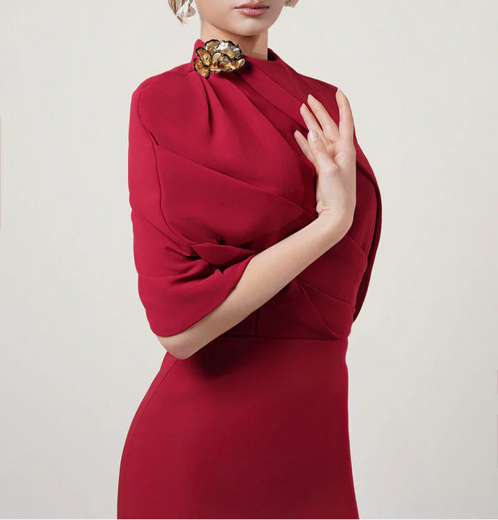 asymmetric cape gown with sculpted shoulder detail – ADRIANA