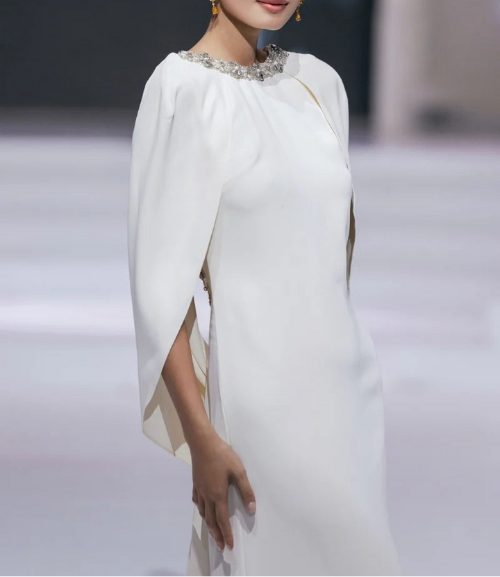 embellished cape-sleeve gown with clean column silhouette – IVORYE