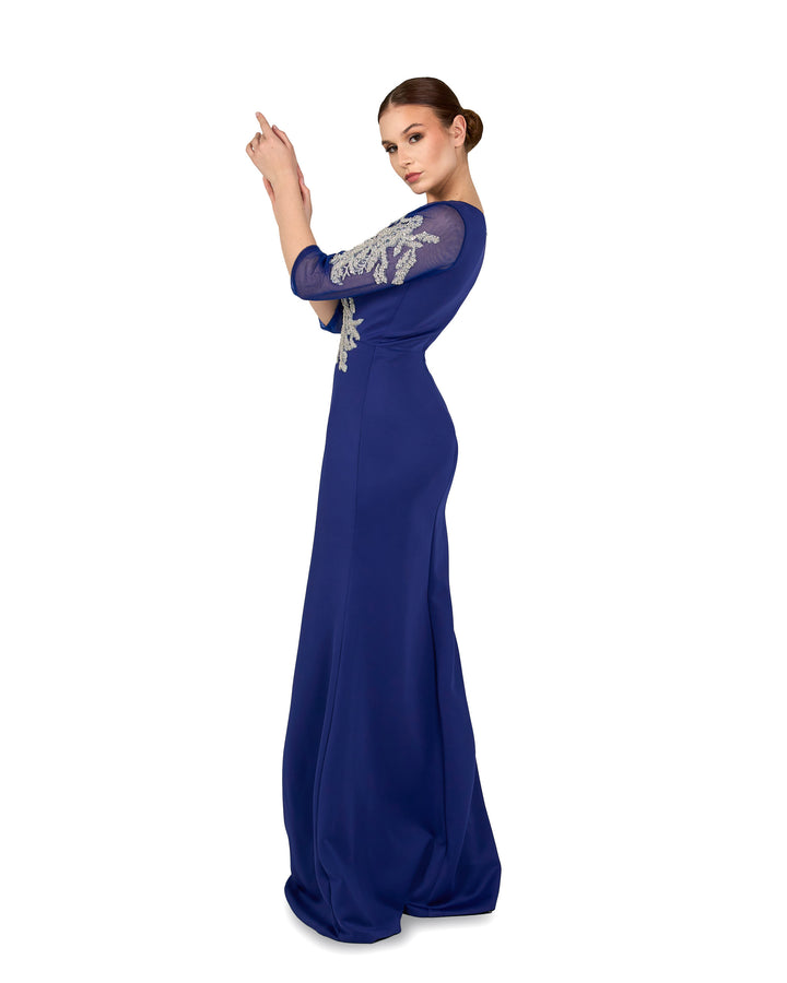 Sequined floor-length blue dress with see-through sleeves