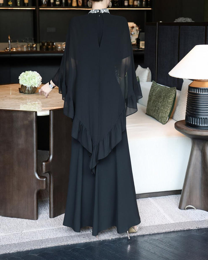 black cape-overlay gown with ruffled chiffon tier – ELIORA