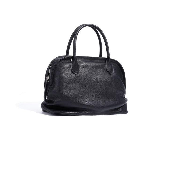 编织藤条手提包，配有双层皮革手柄 – LÉONIE 