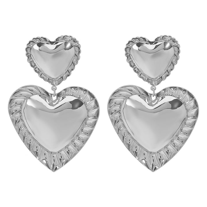heart-shaped drop earrings with sculpted trim - CORAT