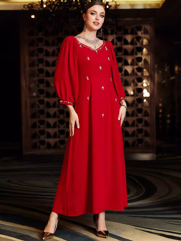 فستان ماكسي أنيق بأكمام طويلة وأكتاف محددة – كاليستا