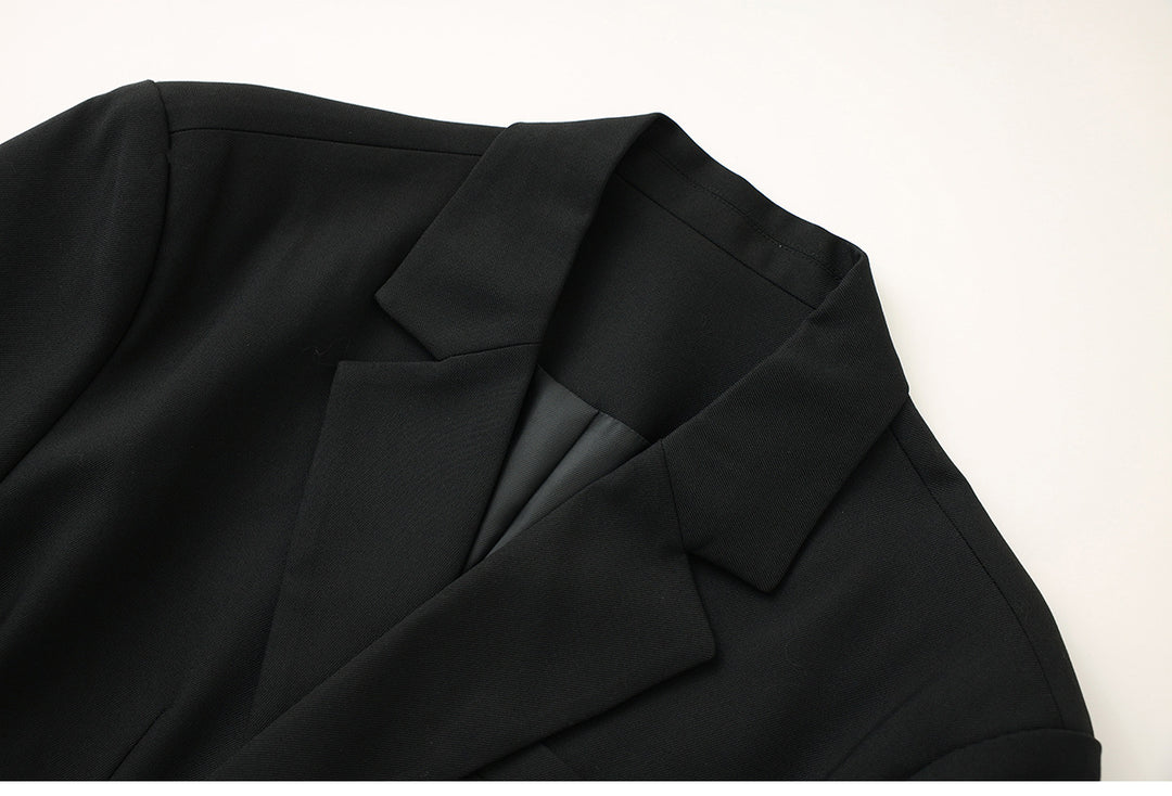 Tailored blazer with asymmetric pin closure – LOCK