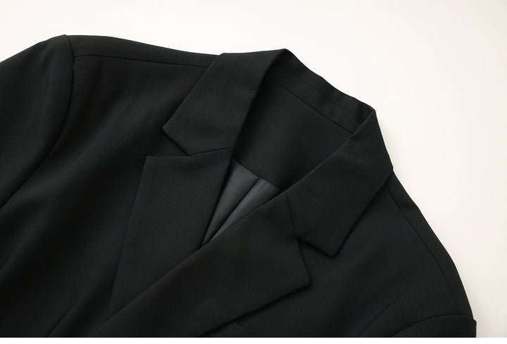 Tailored blazer with asymmetric pin closure – LOCK