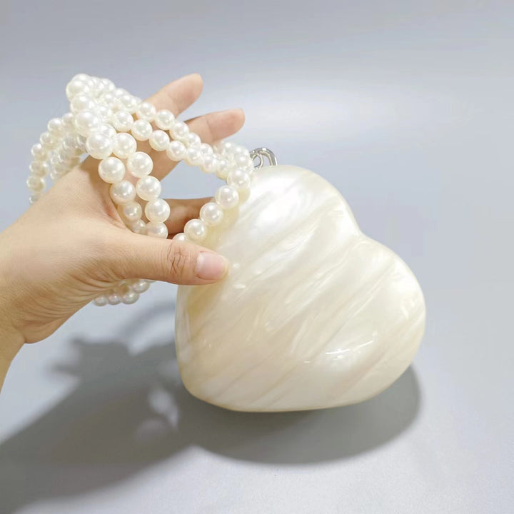 heart-shaped pearl acrylic clutch – AMOUR
