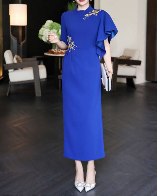 asymmetric sleeve gown with gold floral embellishments – RIVERA