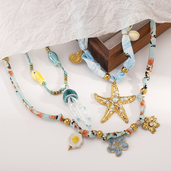 charm pendant necklace with silk and beaded accents – CORALIP