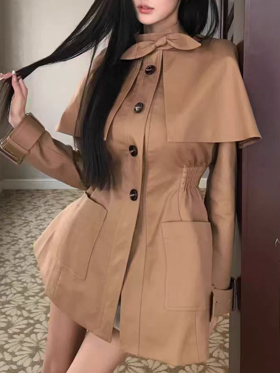 tailored coat with cape overlay and bow neckline – AMBER