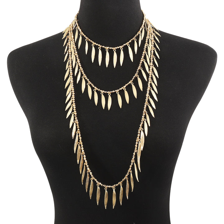 layered leaf pendant necklace with metallic finish – SERENAT