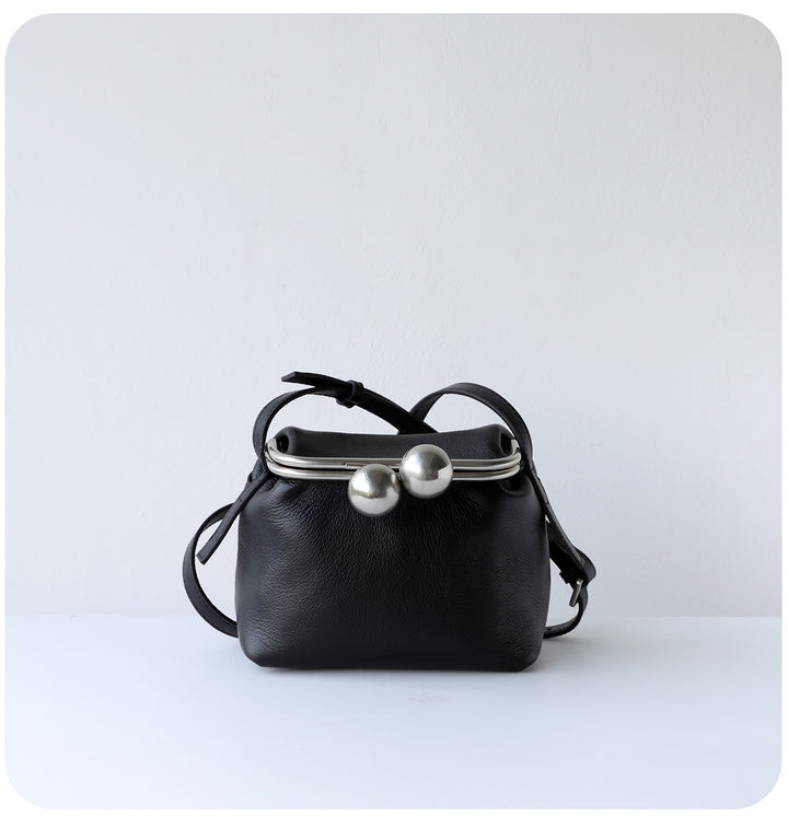 mini leather crossbody bag with metal frame clasp – YOUSF