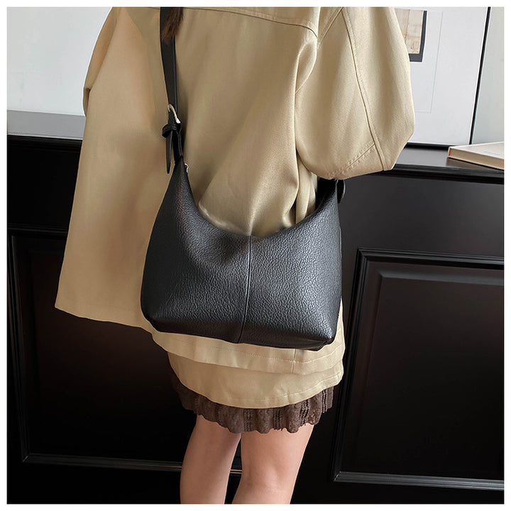 geweven rieten draagtas met dubbele leren handvatten – LÉONIE 