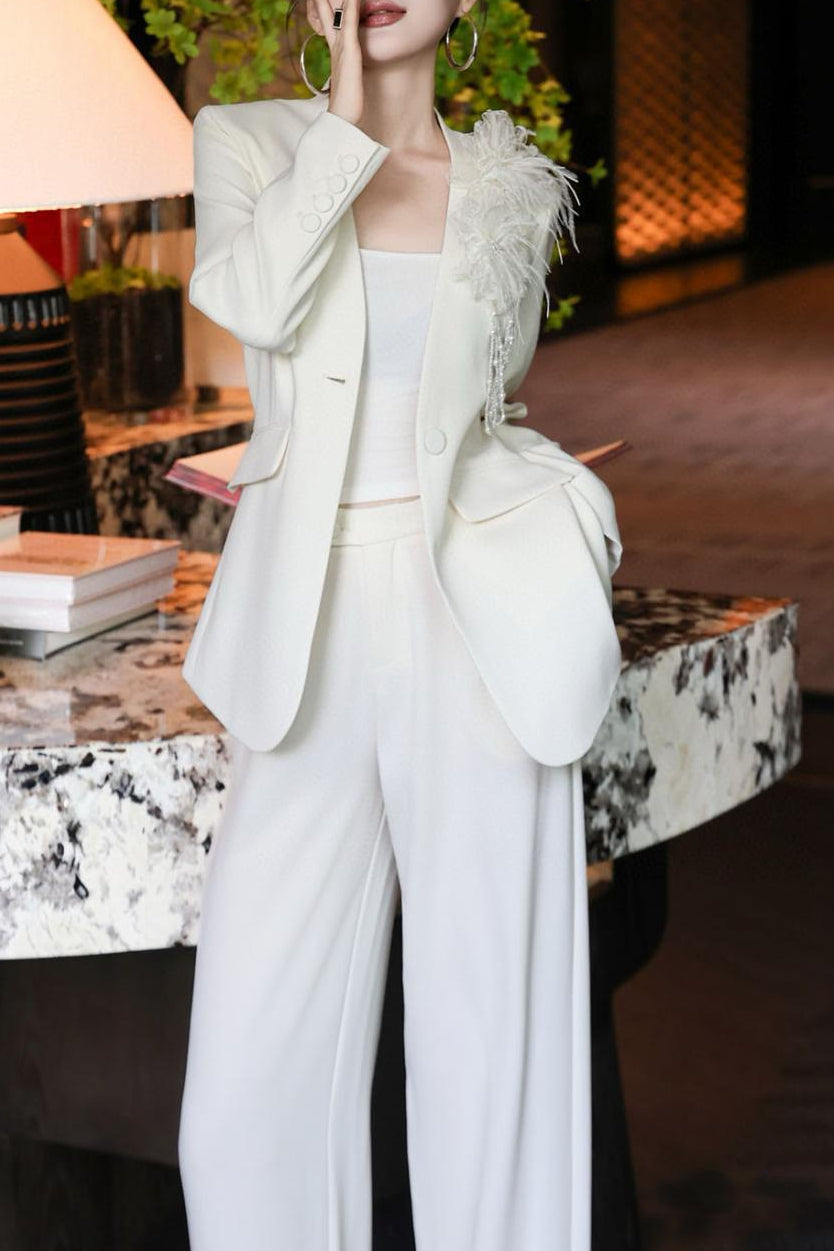 tailored wide-leg suit with floral shoulder accent – LIMEA