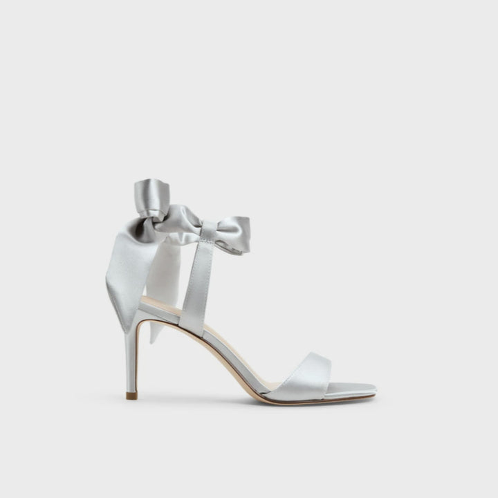 حذاء بكعب عالٍ بنقشة جلد النمر وكعب ستيليتو ذهبي – أريا