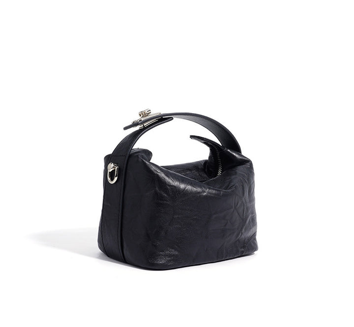 textured leather mini handbag with top handle – NOIRINTA