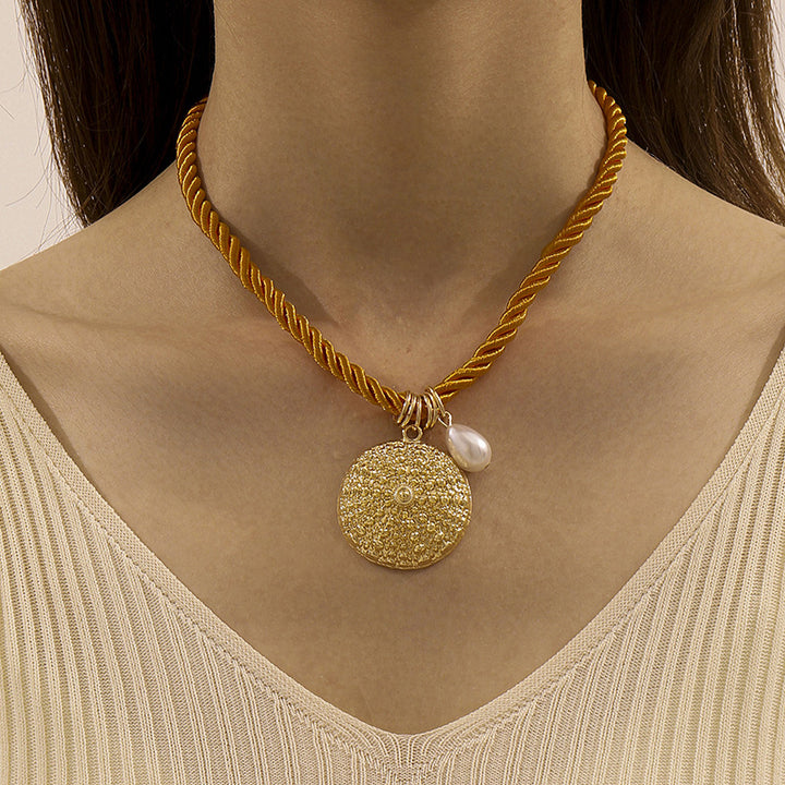 mouwloze uitlopende midi-jurk met kettingriem - CELIAV 