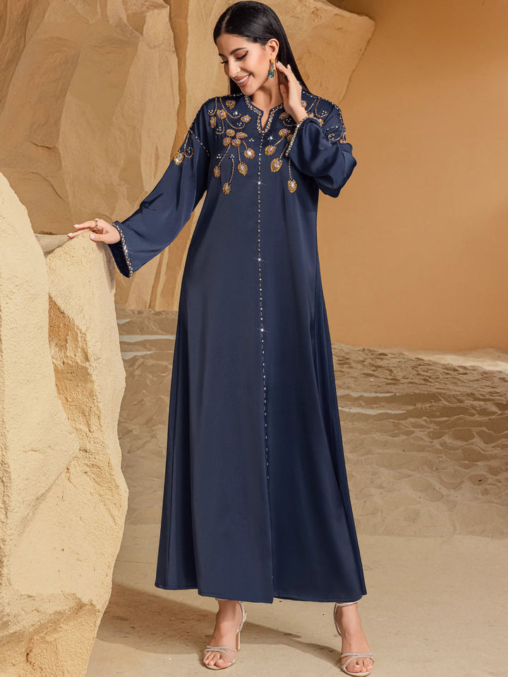 embroidered flare-sleeve maxi dress with front embellishment - NAIMA