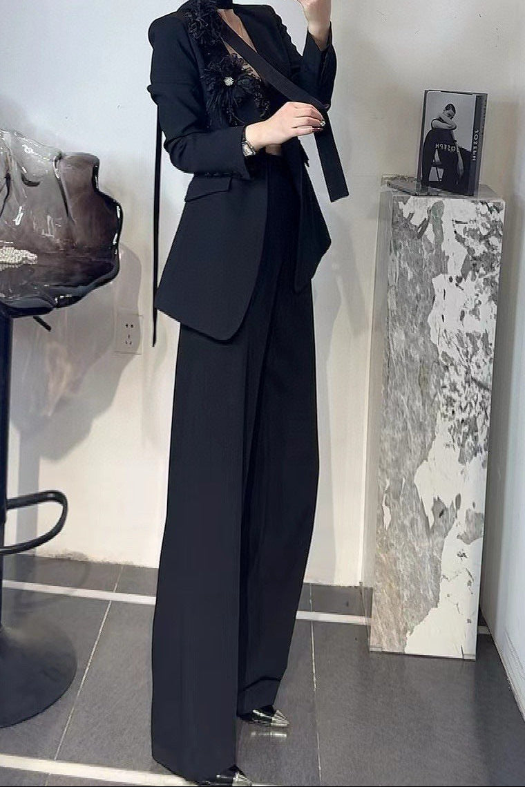 tailored wide-leg suit with floral shoulder accent – LIMEA