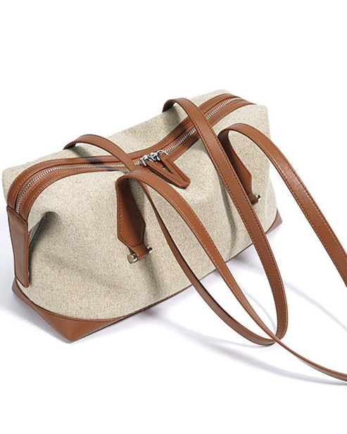 编织藤条手提包，配有双层皮革手柄 – LÉONIE 