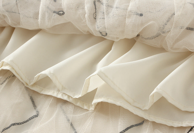 layered tulle skirt with contrast wave edging – SERENE