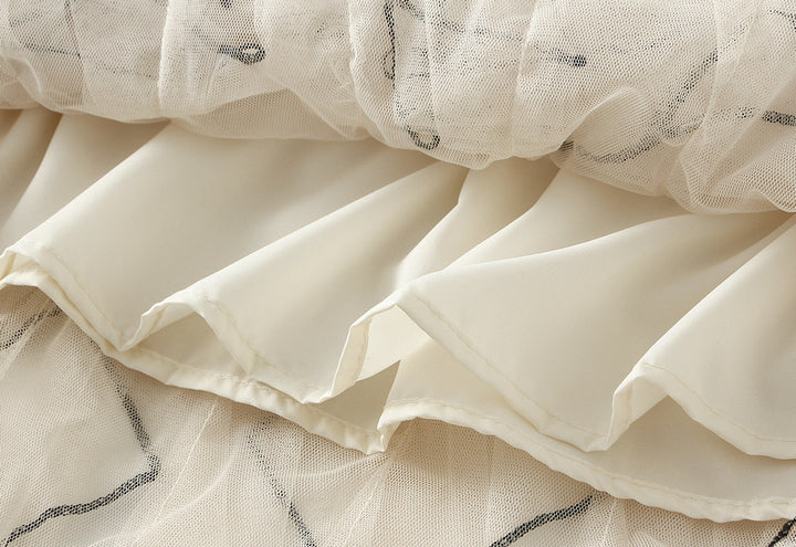 layered tulle skirt with contrast wave edging – SERENE