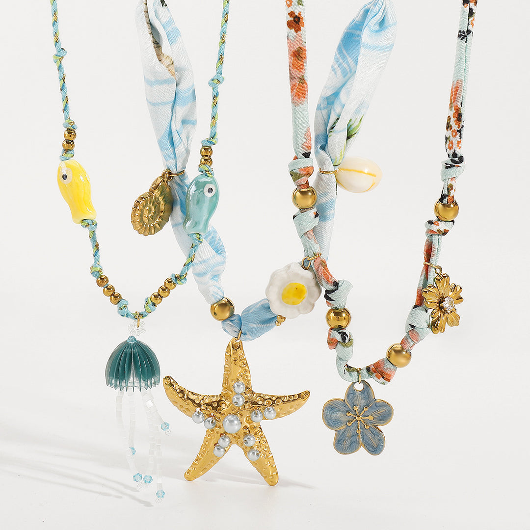 charm pendant necklace with silk and beaded accents – CORALIP