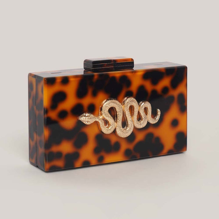 tortoiseshell acrylic clutch with gold snake detail – SERPENTIA
