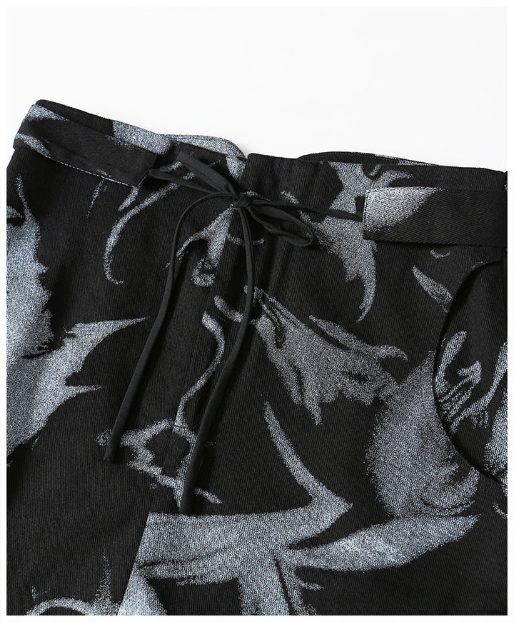 asymmetrical skirt with metal buckle details – RAVEN