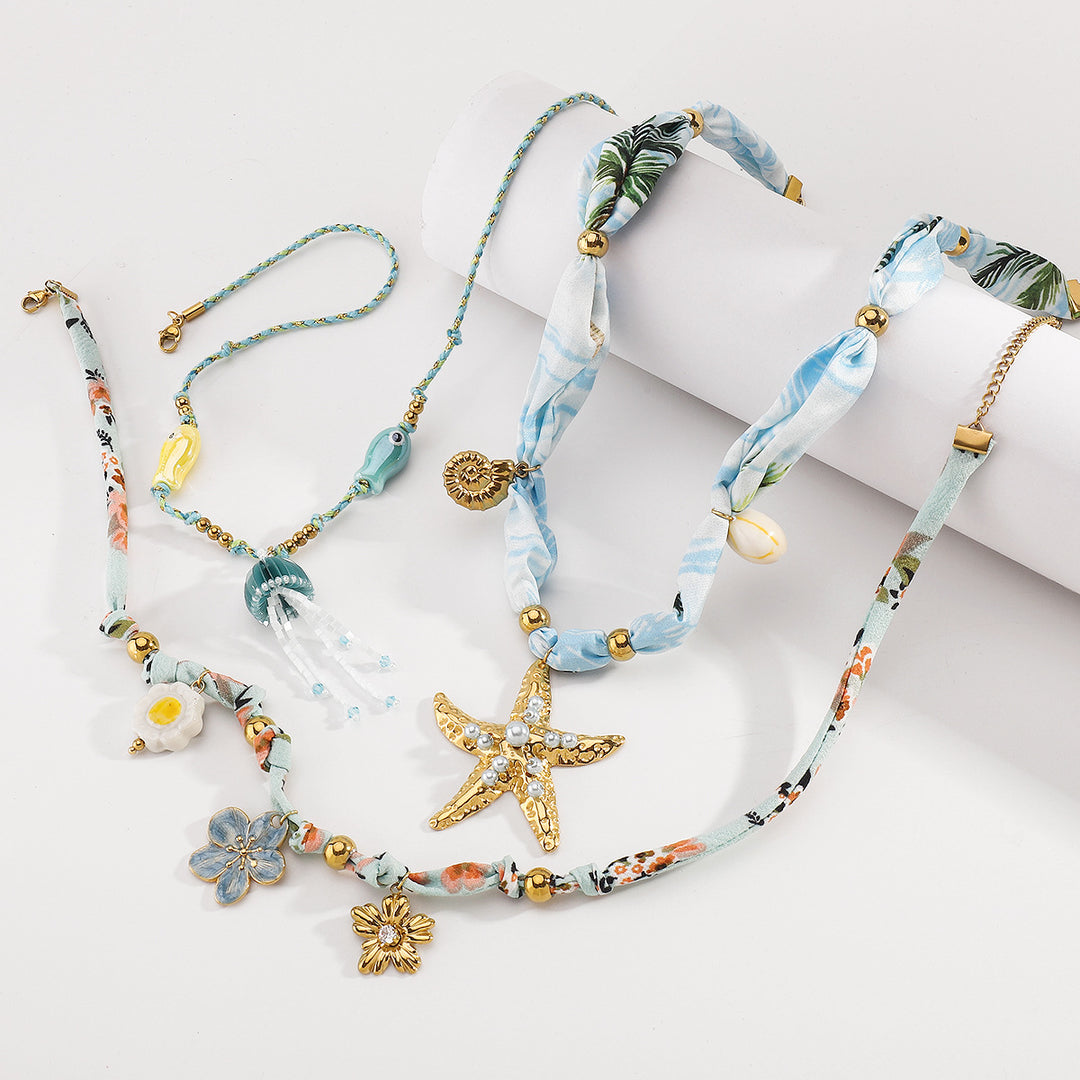 charm pendant necklace with silk and beaded accents – CORALIP