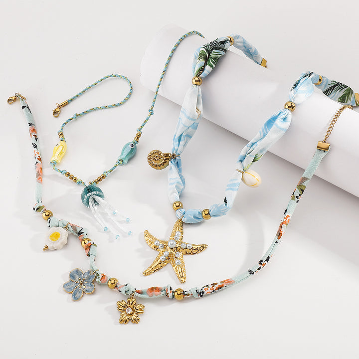 charm pendant necklace with silk and beaded accents – CORALIP