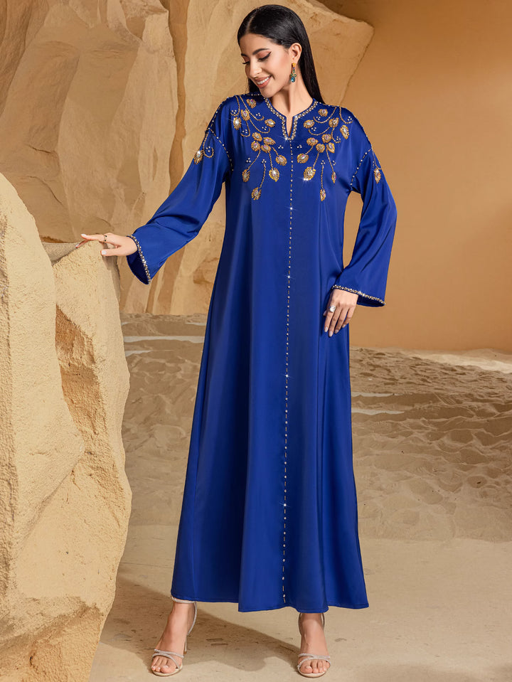 embroidered flare-sleeve maxi dress with front embellishment - NAIMA
